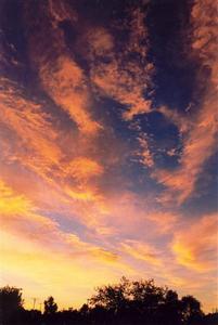 Orange sunset cloud streaks over Ojai